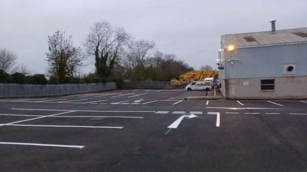 Freshly marked car park at J N Bentley Shifnal with bays, arrows, and pedestrian crossings.